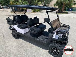White Aluma 6 Passenger Lifted Golf Cart affordable golf cart rental, golf cart rent cabo san lucas